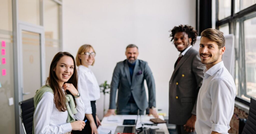 Diverse group of colleagues collaborating in a modern conference room setting.